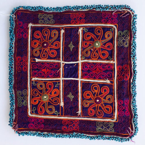 Small vintage Afghan embroidered textile with beads.